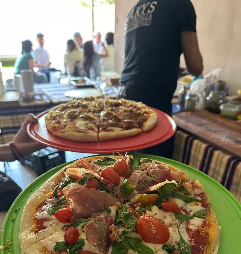 Pizzas artesanales preparadas por Taky's Eventos